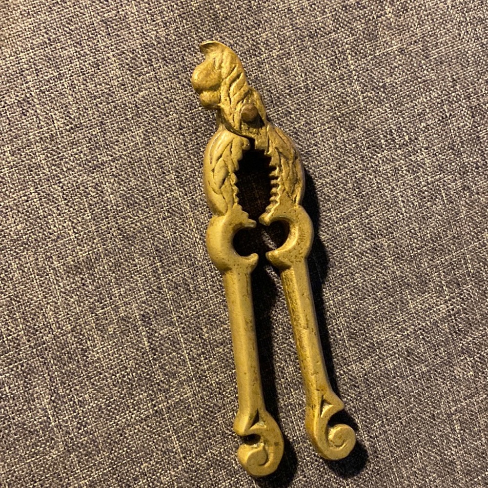 Vintage brass parrot bottle opener